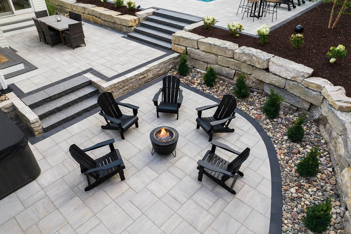 Natural stone patio in a landscaped outdoor living space