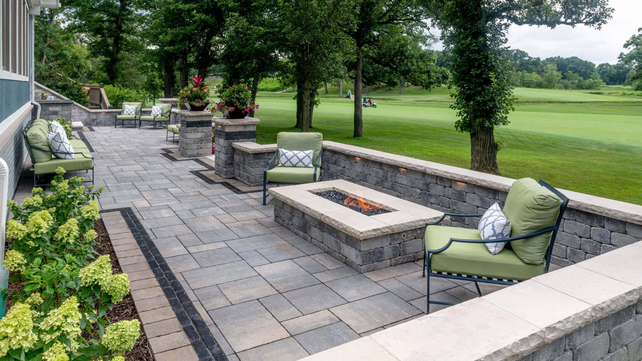 Natural stone pavers in a landscaped outdoor living space